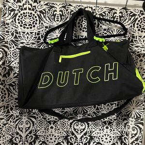 Green and black Dutch Bros duffel bag